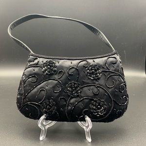Black satin evening bag. Bead roses detail.